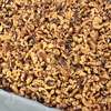 Commodity Nutmeats Commodity Light Amber Combo Walnut Halves & Pieces 25lbs 497405